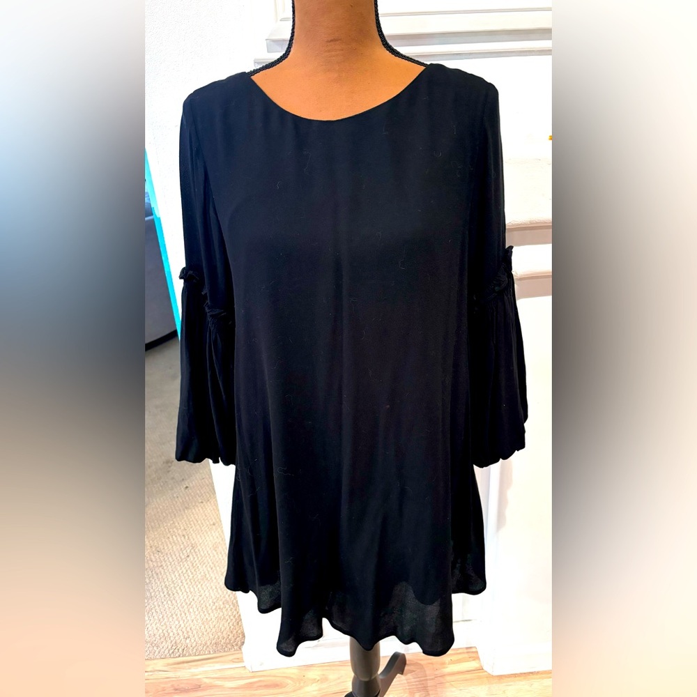 Freshly dry-cleaned Forever 21 black dress with bell sleeves in size large.